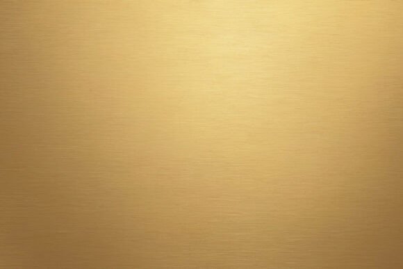 Golden Brushed Metallic Surface Background: Elevating Design with Texture and Light